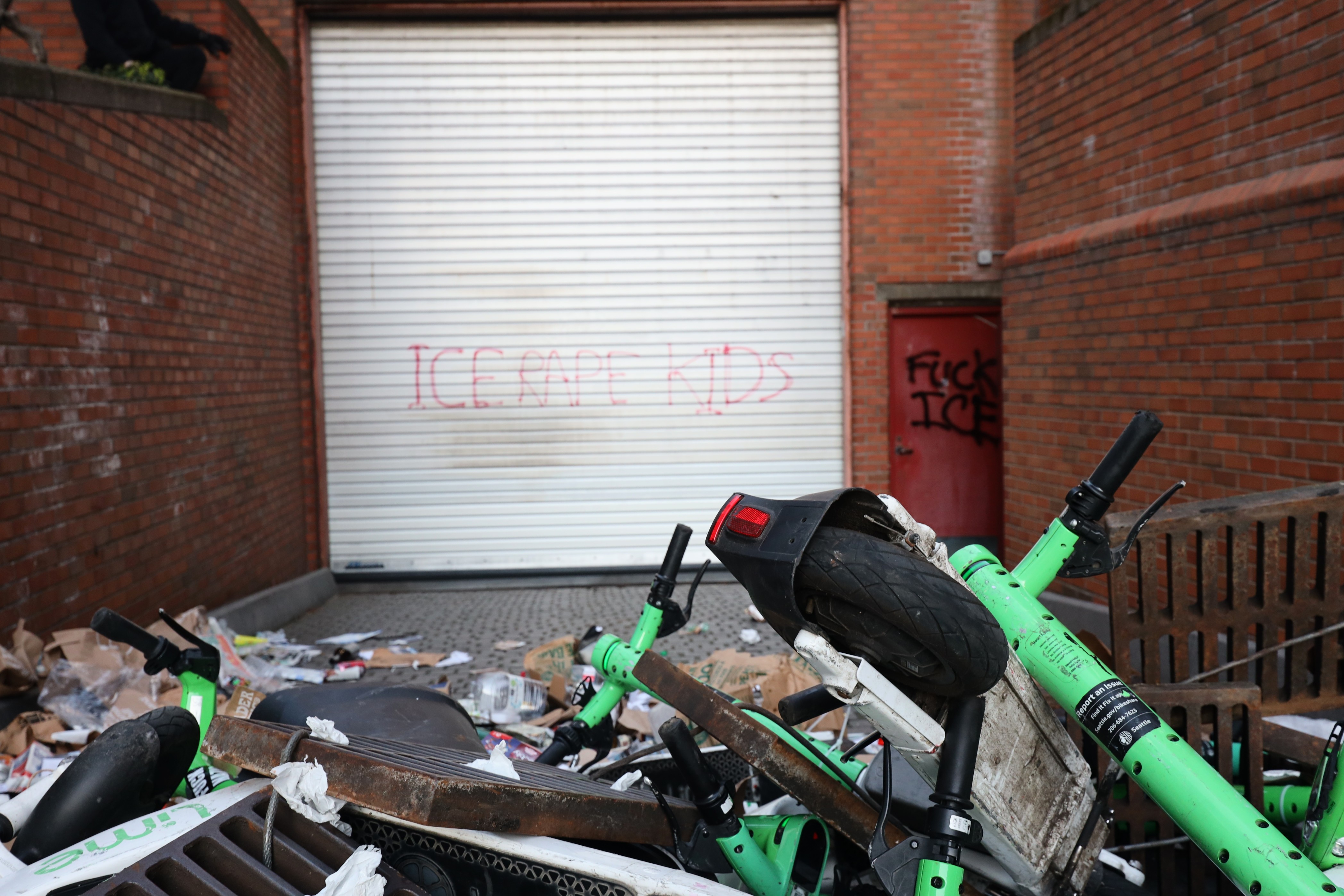 Trash, shaming, light vandalism: April 7 autonomous action outside Seattle’s federal&nbsp;building