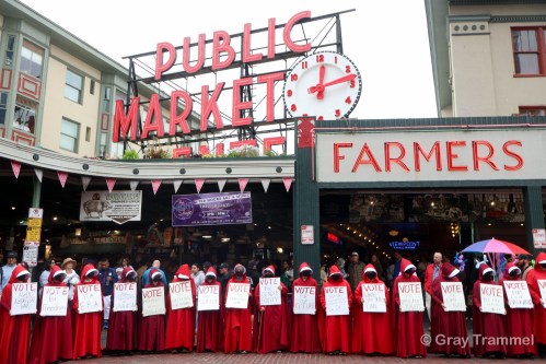 Seattle Handmaids hold large demonstration at Pike Place Market to emphasize global and local&nbsp;oppression